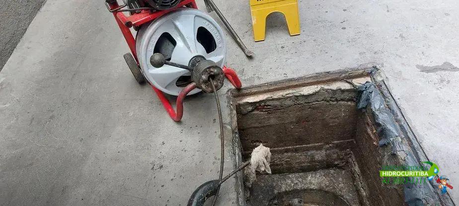 Limpeza de caixa de gordura em prédio no bairro Guaíra, Curitiba